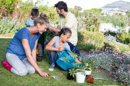 Professional gardeners working in a vibrant garden